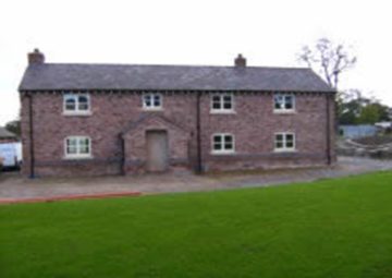 Renovated Brick House that has been repointed and touched up.